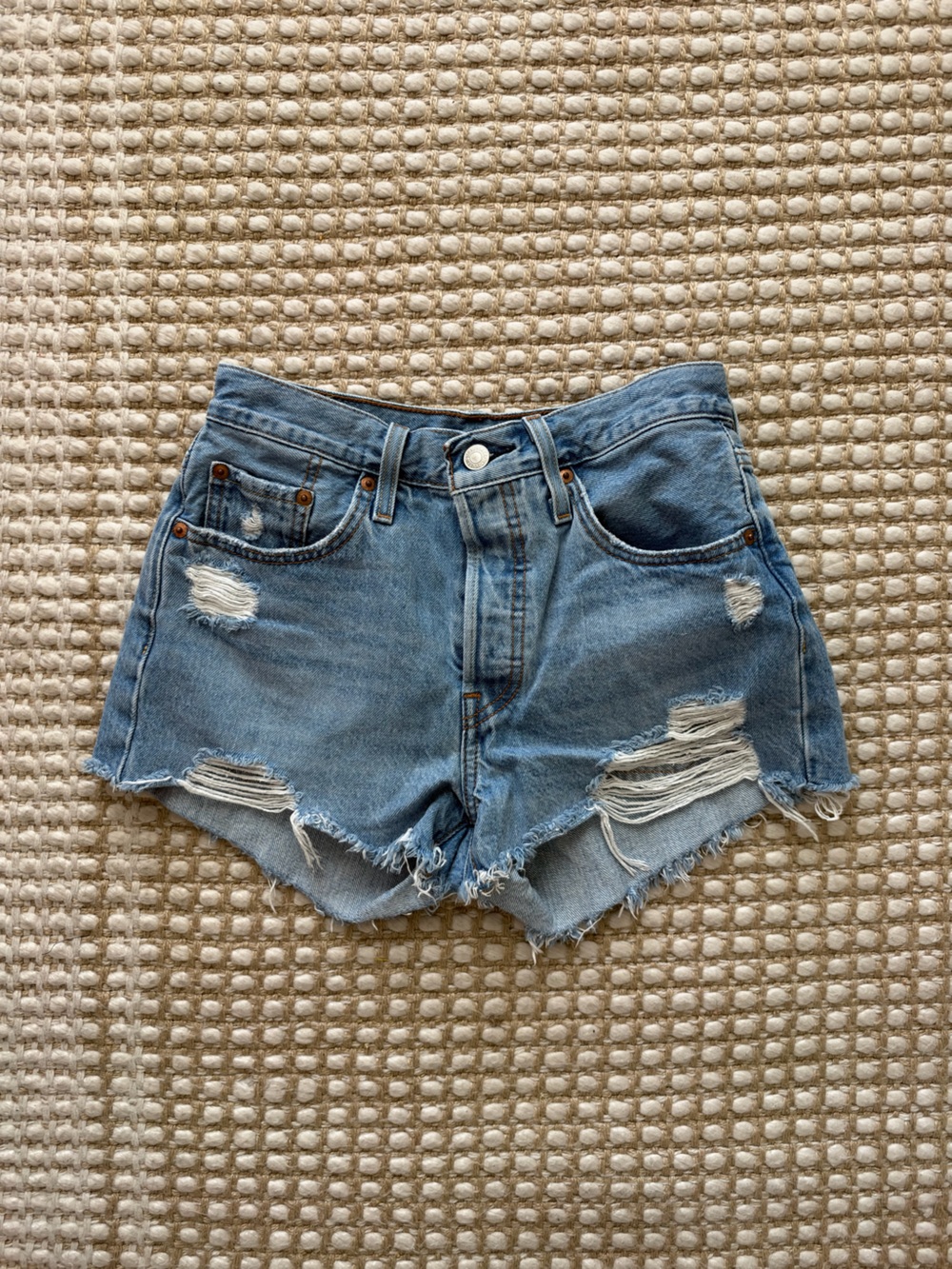 Levi's Distressed Light Blue Denim Cutoff Shorts